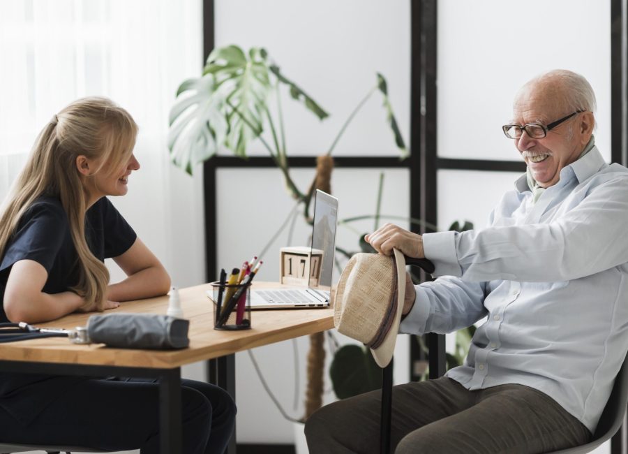 smiley-senior-man-nursing-home-with-nurse